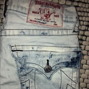Acid washed ripped denim